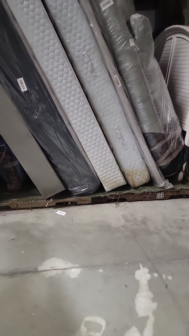 Standing water warehouse wet mattresses